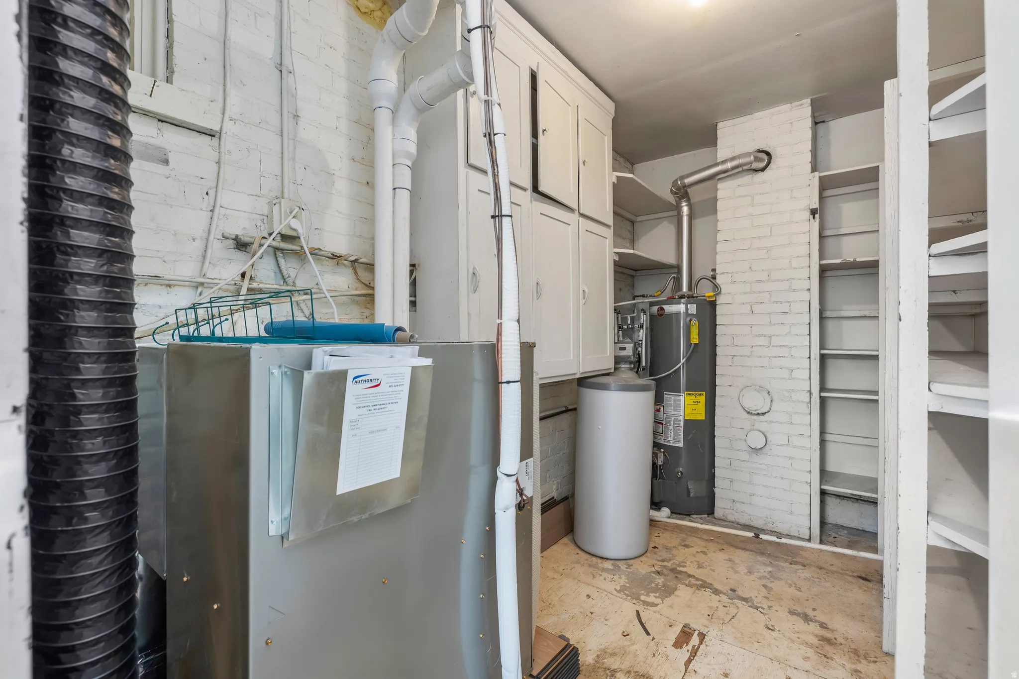 Utilities with water heater, water softener