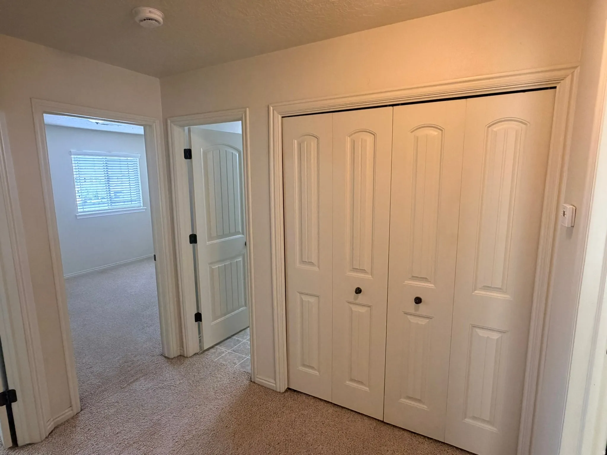 Top of the stairs.  Laundry closet among the bedrooms.
