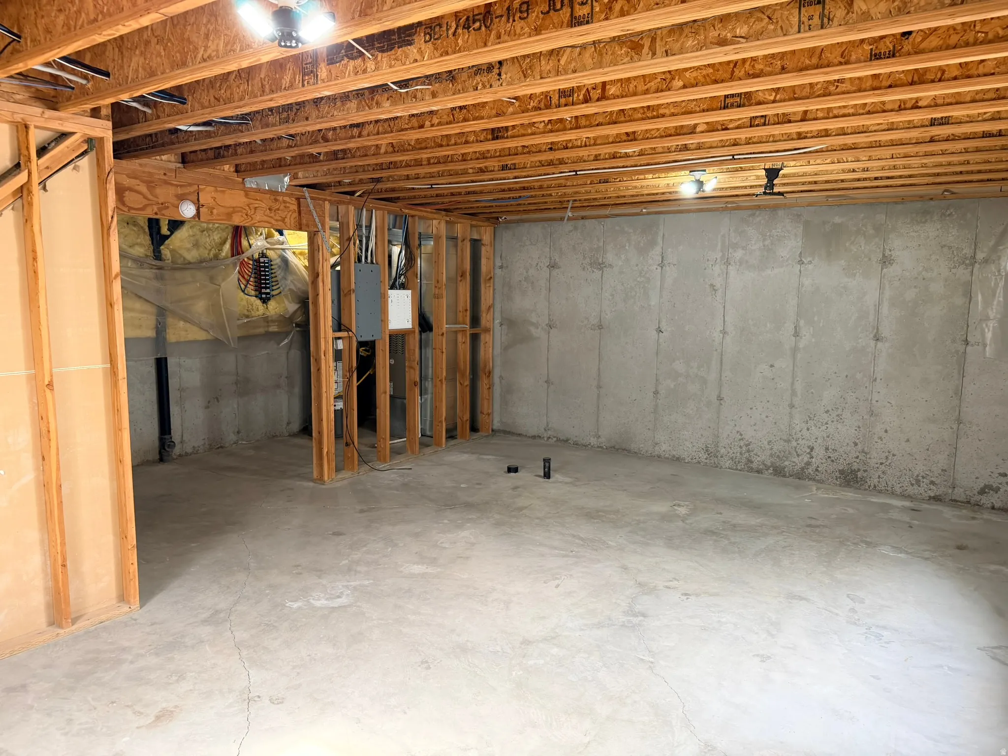 View of unfinished basement.  Stubbed for an fourth bathroom.
