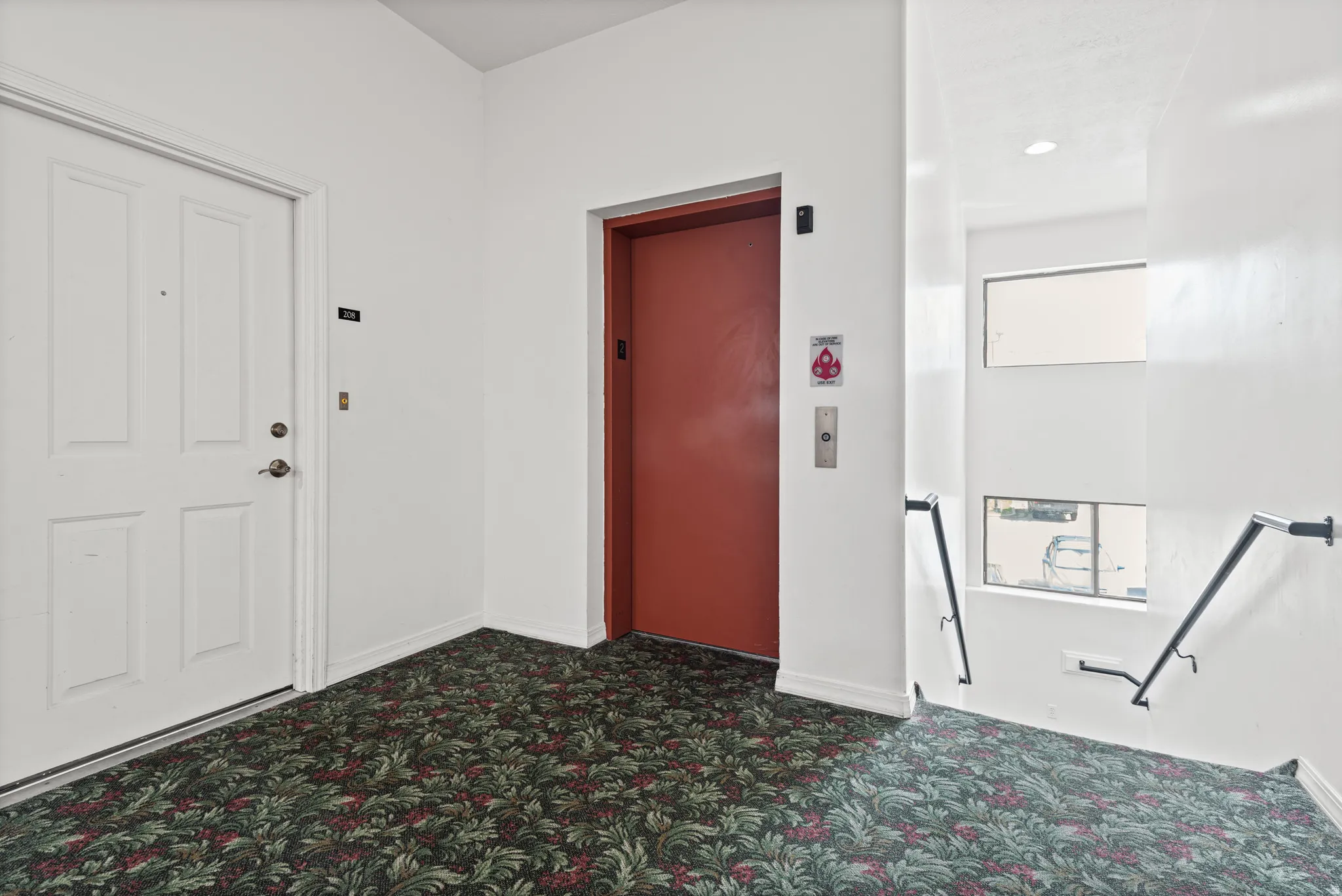 Foyer featuring elevator to make moving and groceries easy for everyone!