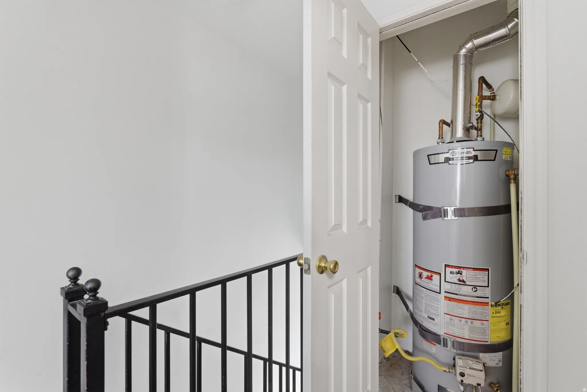 Utilities with strapped water heater
