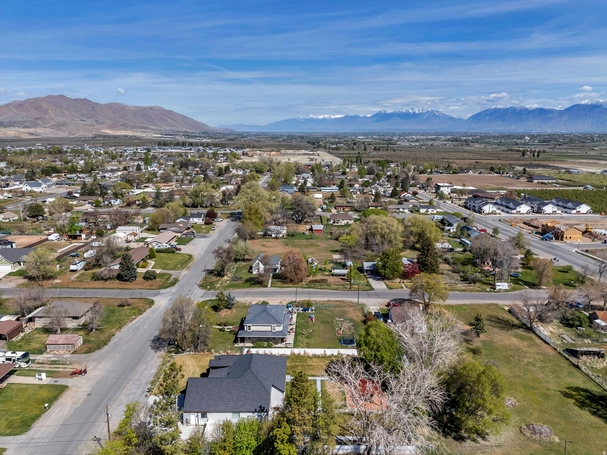 View of property location featuring nearby suburban area and a mountainous background