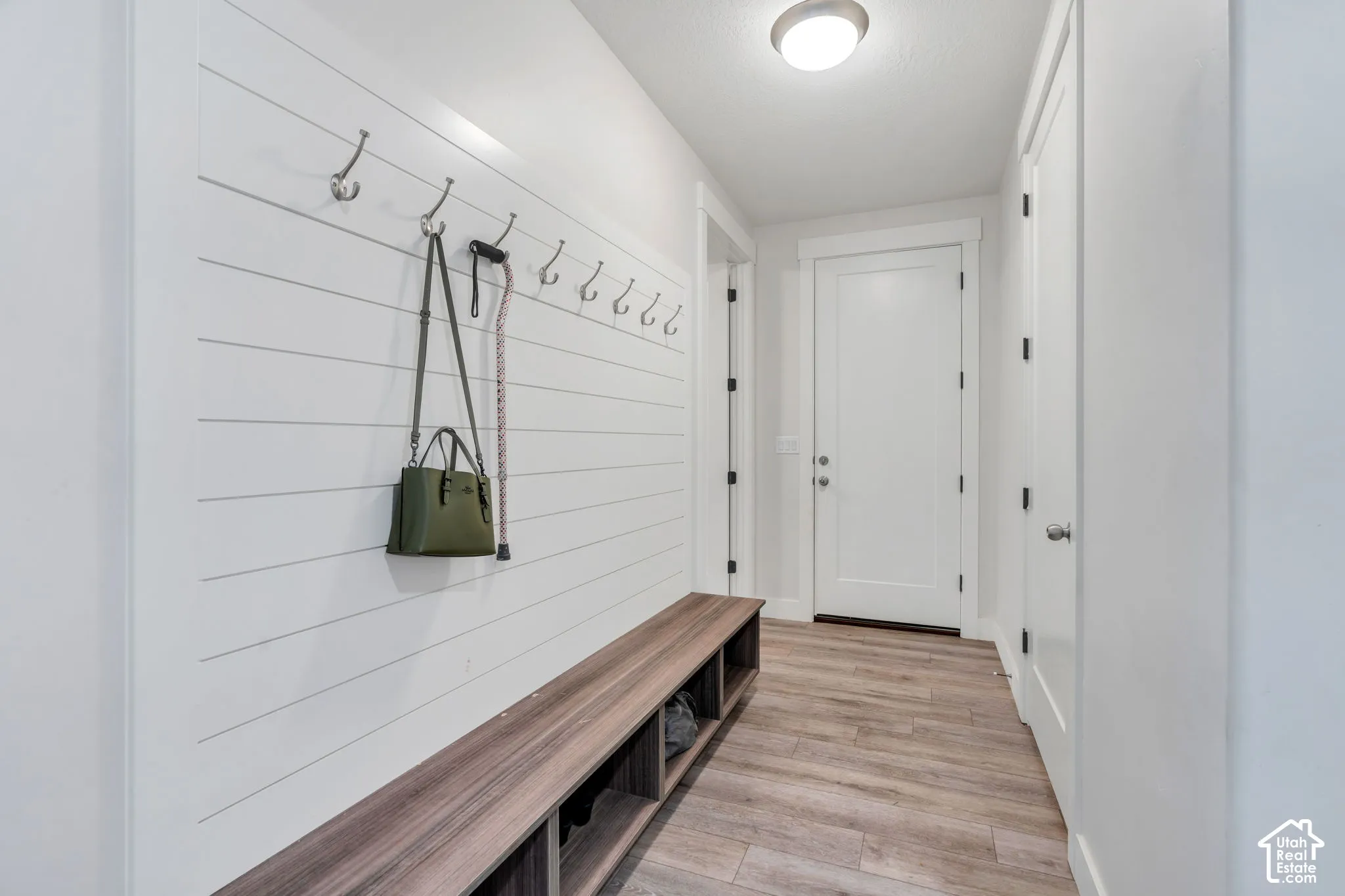 Mudroom area with storage