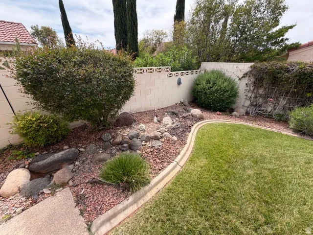 View of fenced backyard