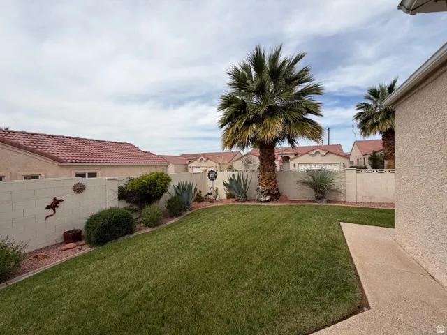 View of fenced backyard