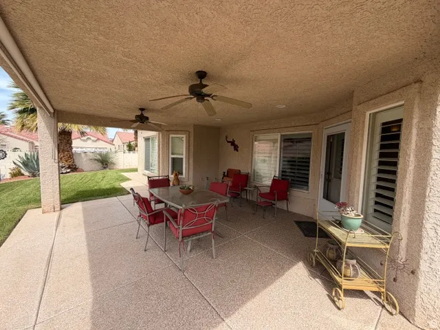 View of patio / terrace featuring ceiling fan and outdoor dining space