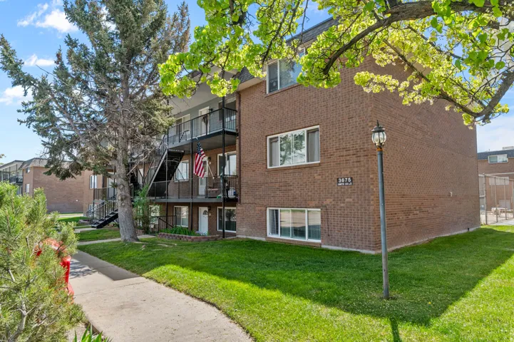 View of apartment building / complex with stairway