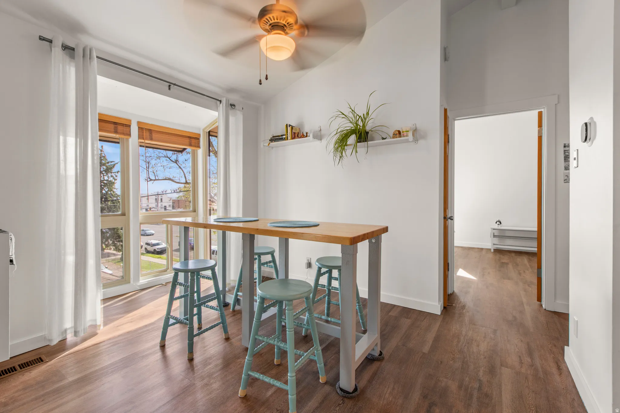 Dining area with large windows and LVP flooring
