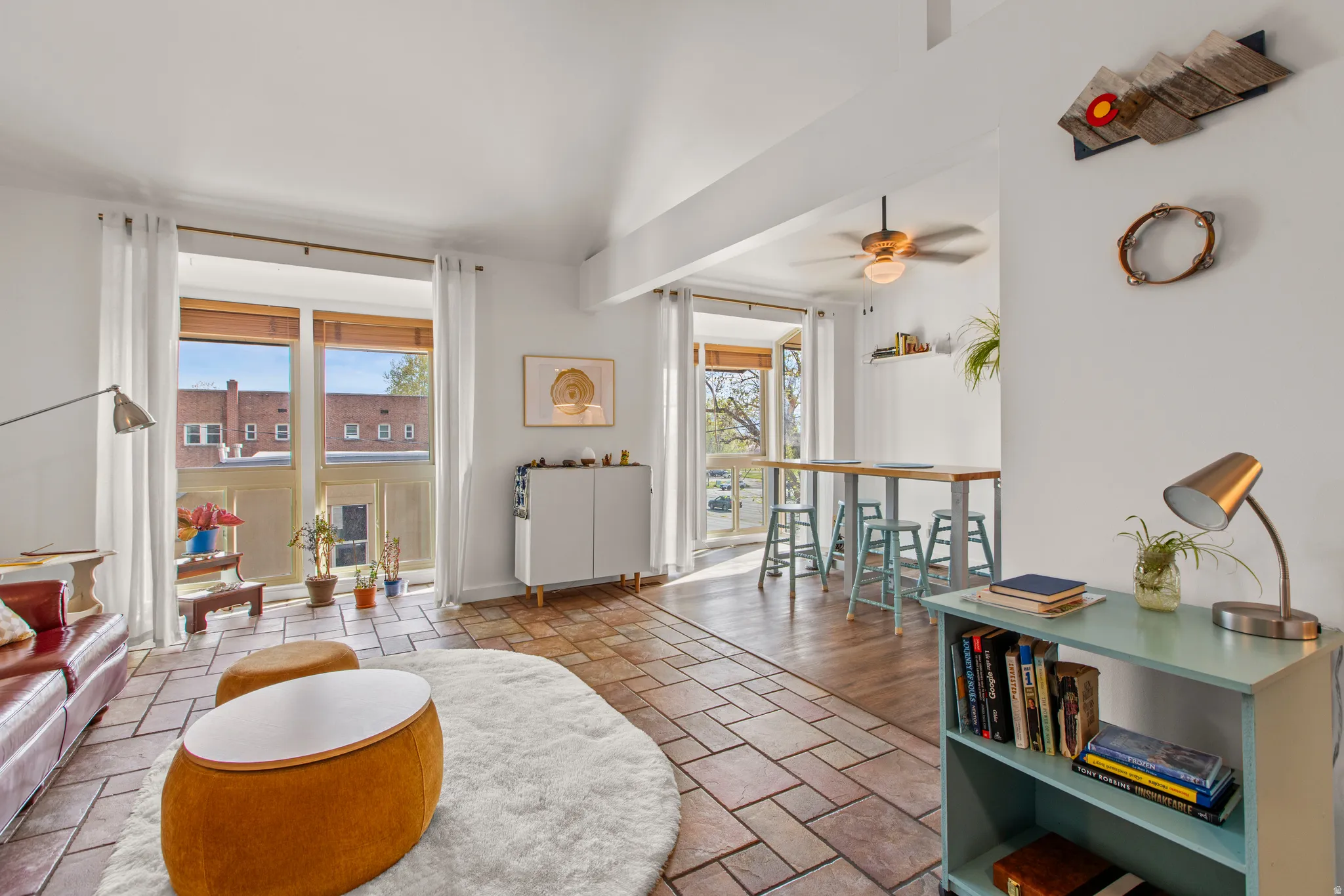 Living room featuring large windows and natural light