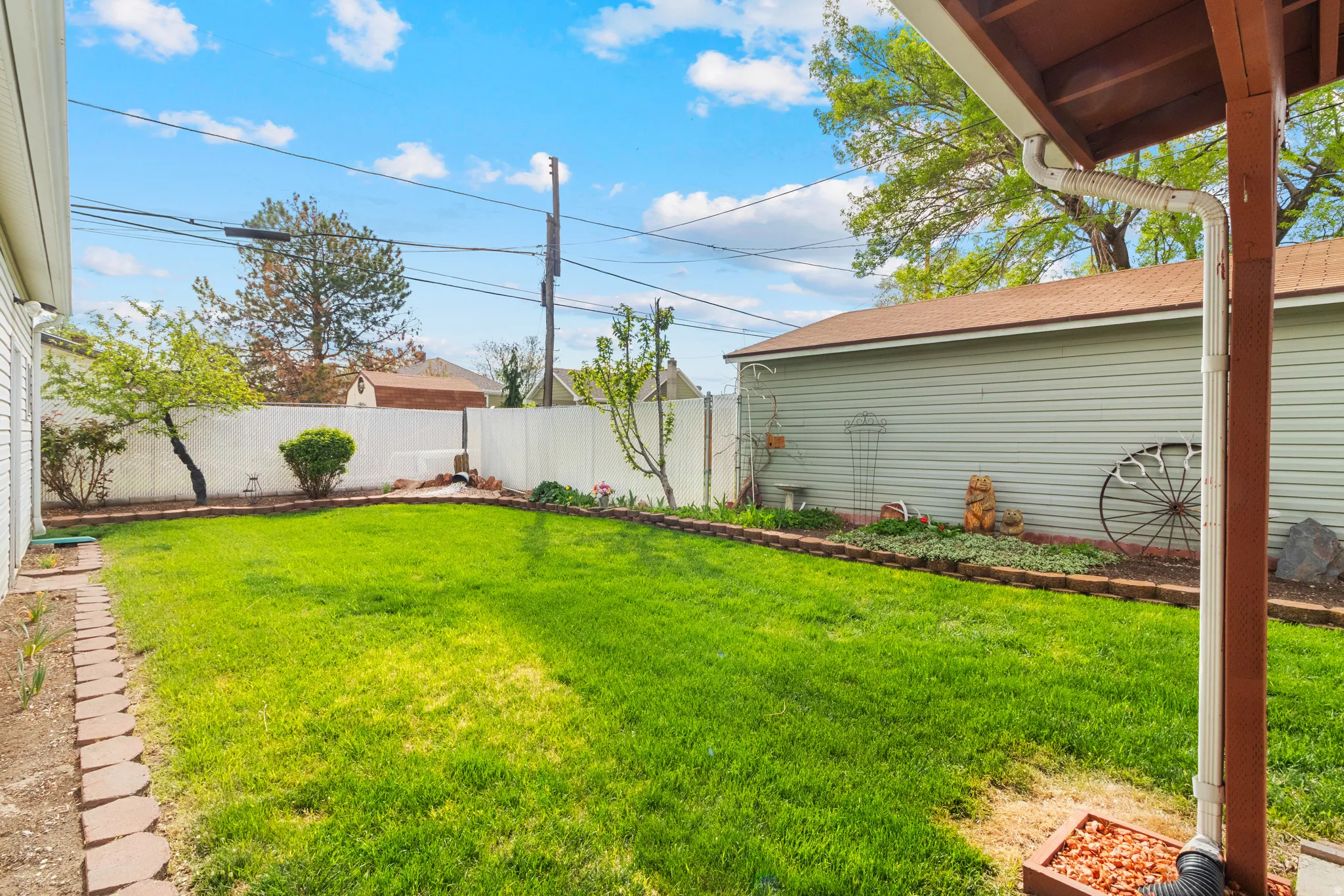 View of fenced backyard