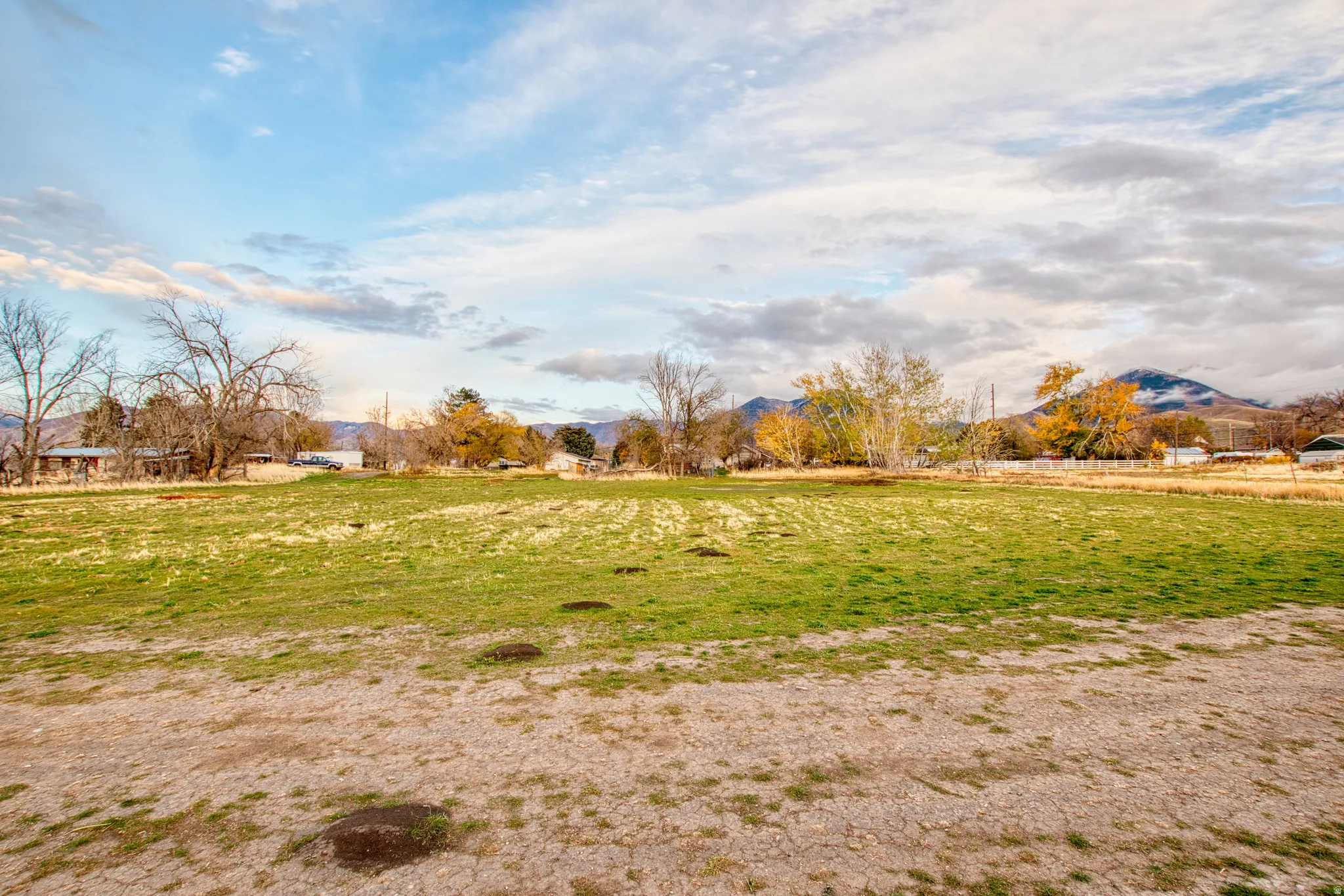 View of yard with a mountain view and a rural view