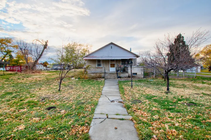 Bungalow-style home with a porch