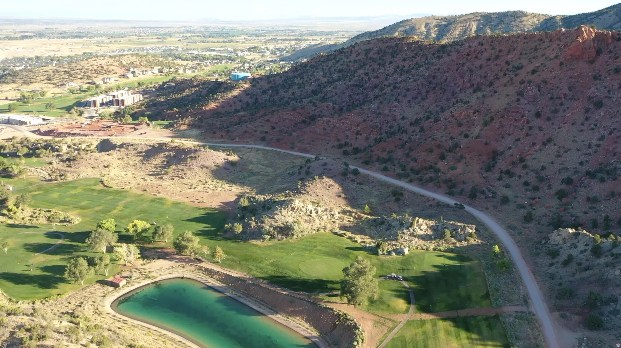 Aerial view of mountains and a golf course