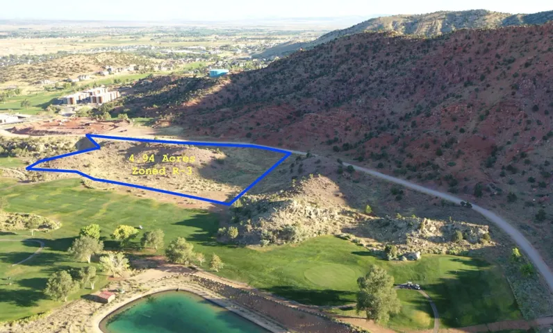 Aerial overview of property's location with property parcel outlined
