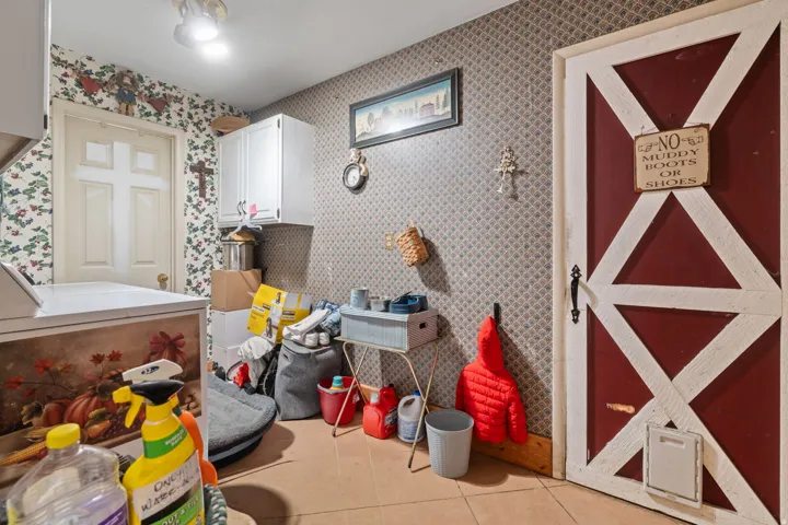 Miscellaneous room featuring light tile patterned floors