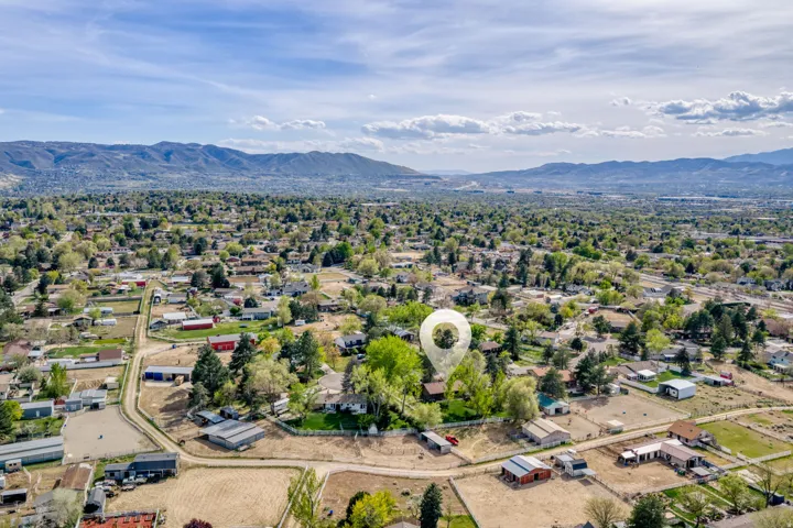 Aerial view of residential area with mountains