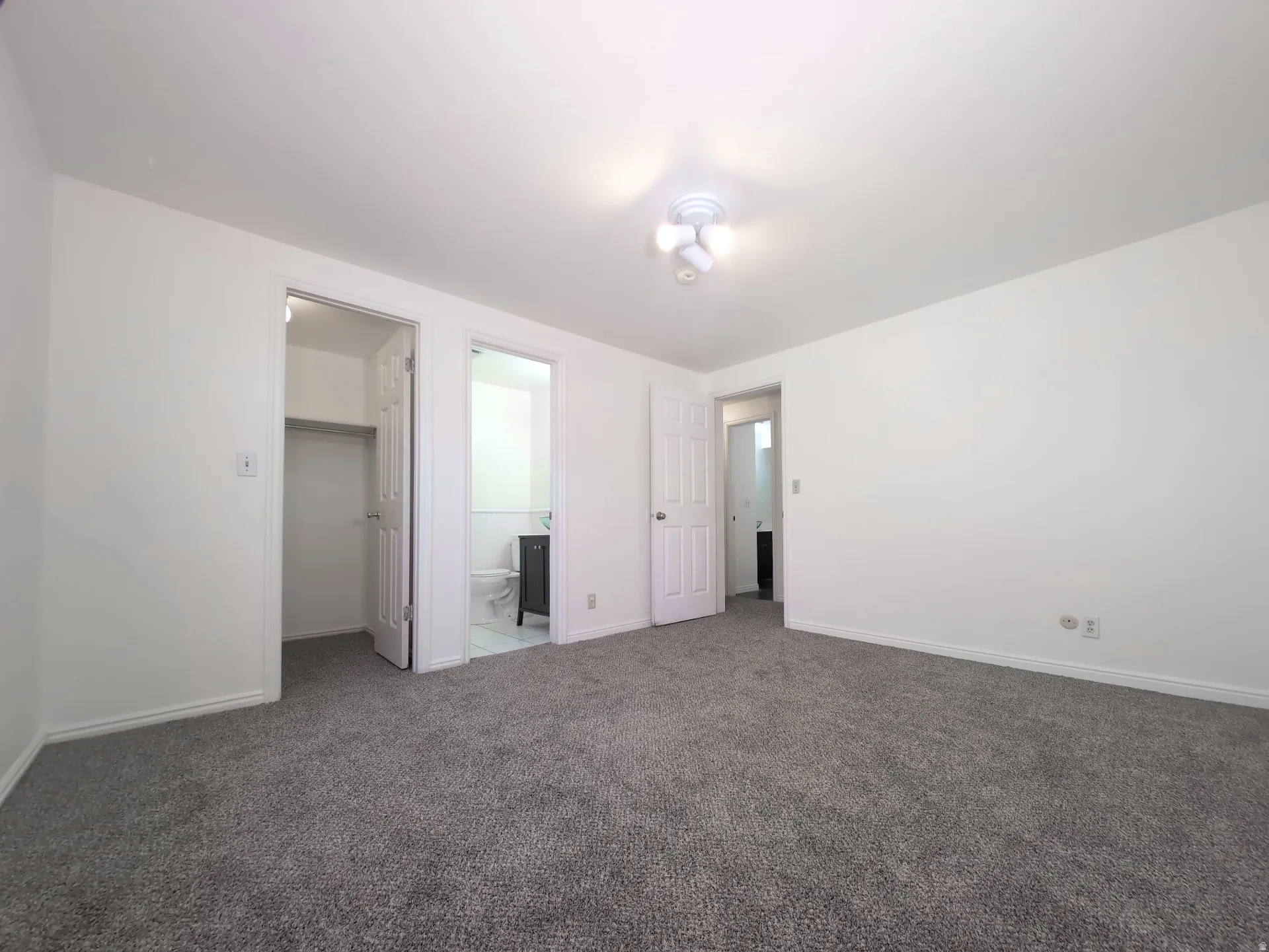Primary Bedroom with attached bathroom suite
