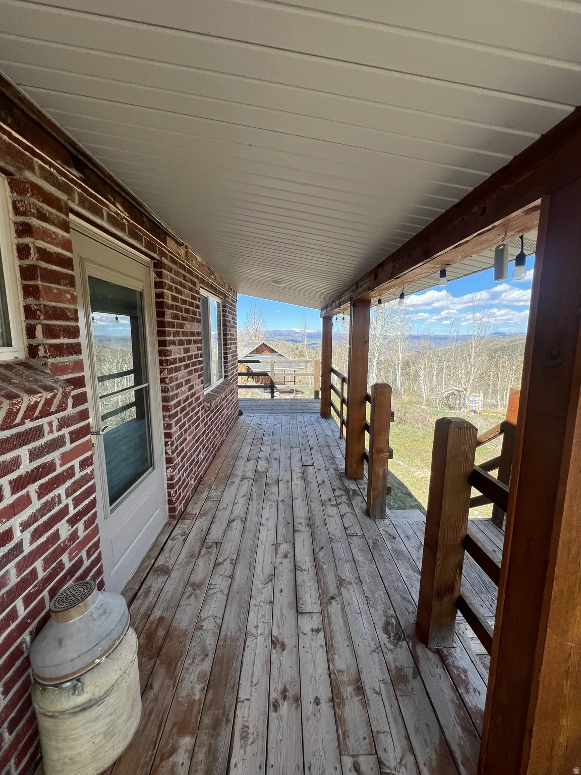 View of wooden porch looking to the North