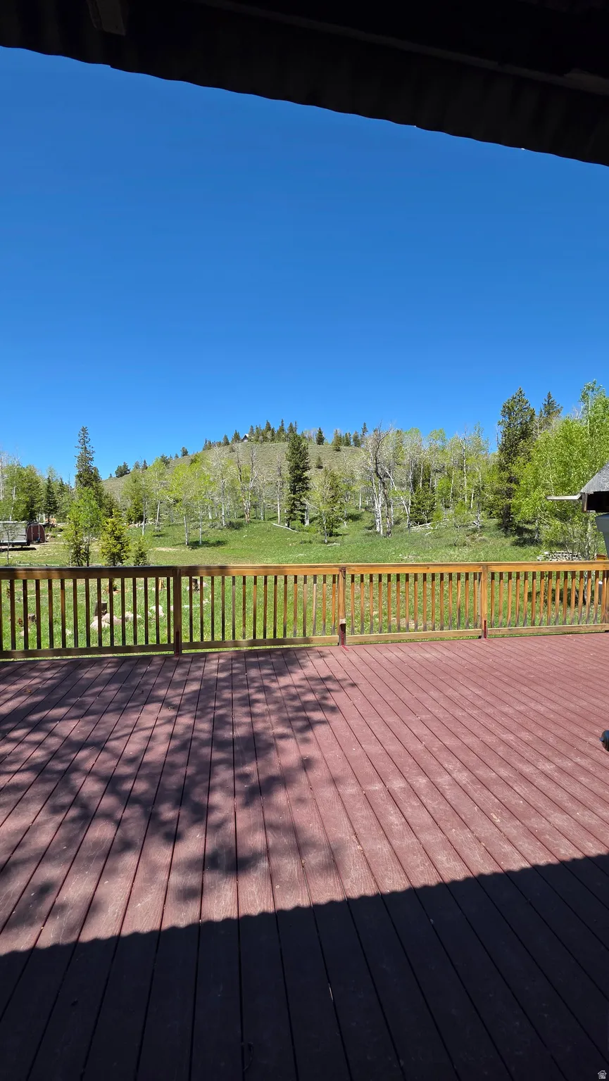 Expansive outdoor deck with a wooden railing system