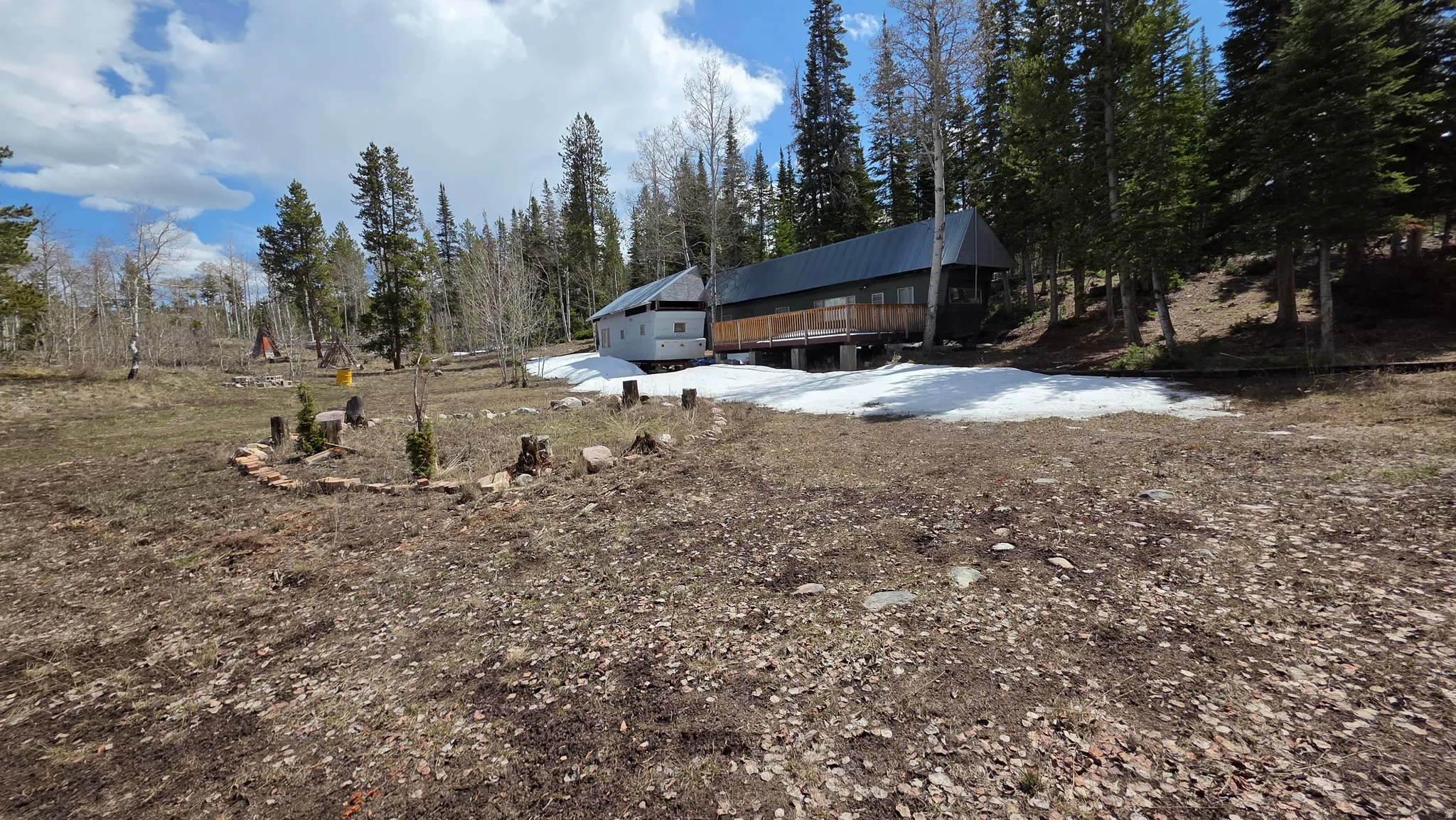 View of yard with a deck