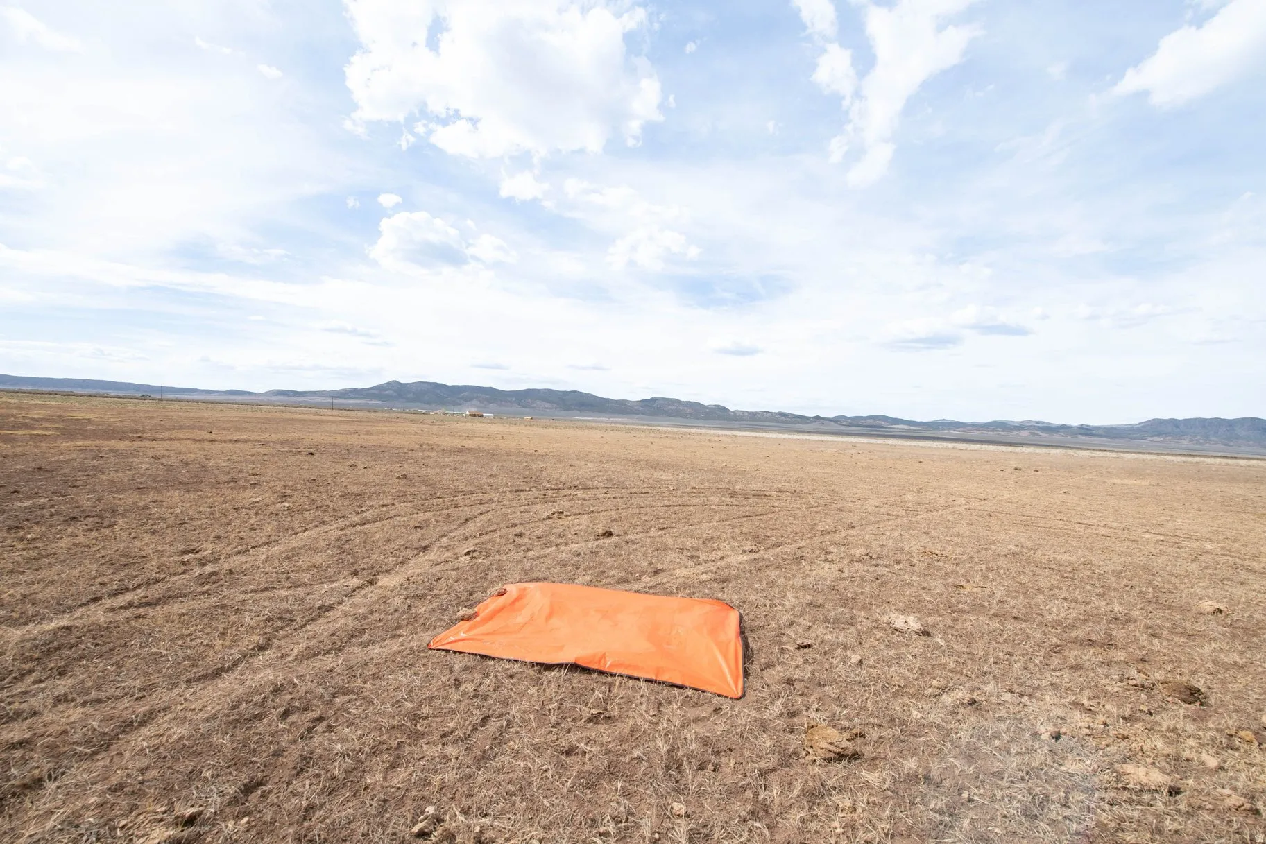View of yard featuring a mountain view, a view of rural / pastoral area, and view of desert