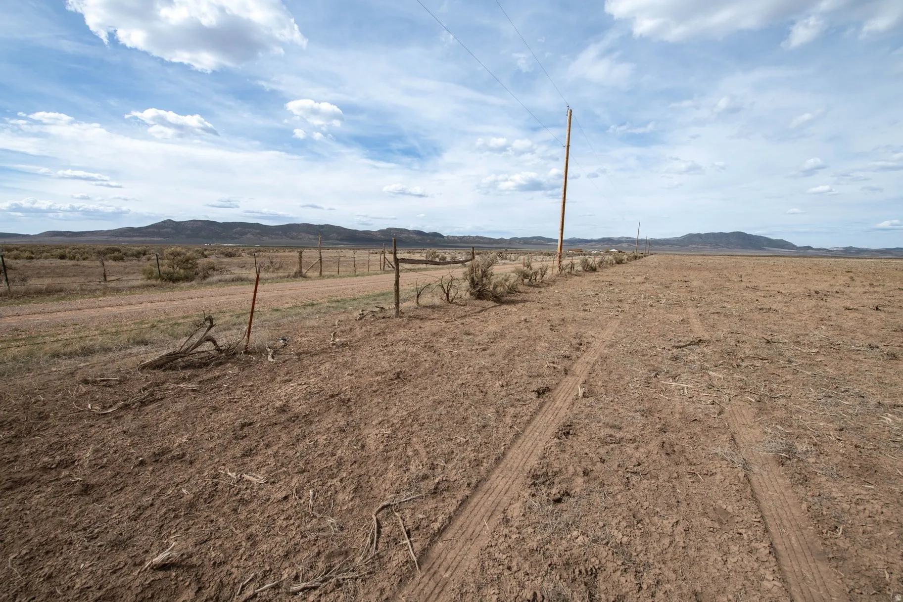 View of yard with a view of countryside and a mountain view