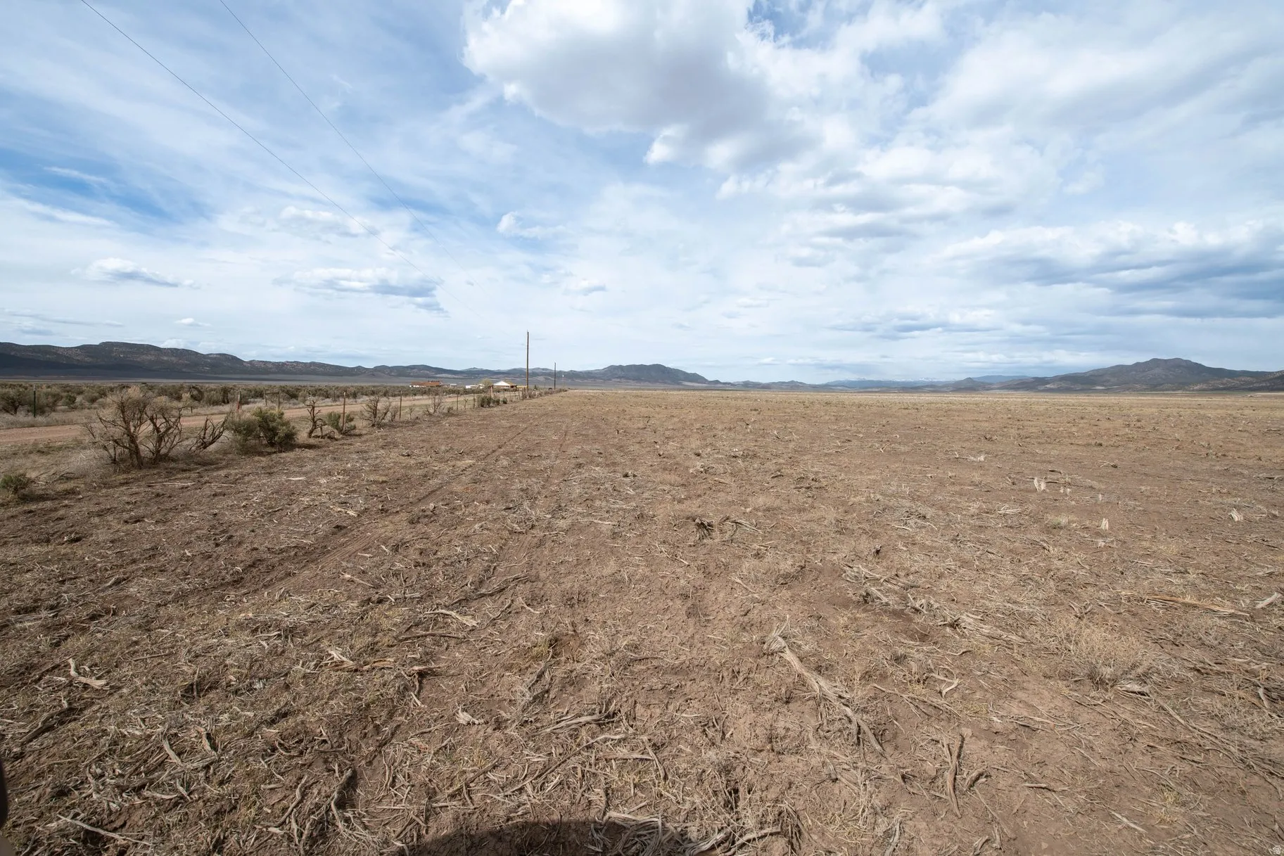 View of yard featuring a view of rural / pastoral area and a mountain view