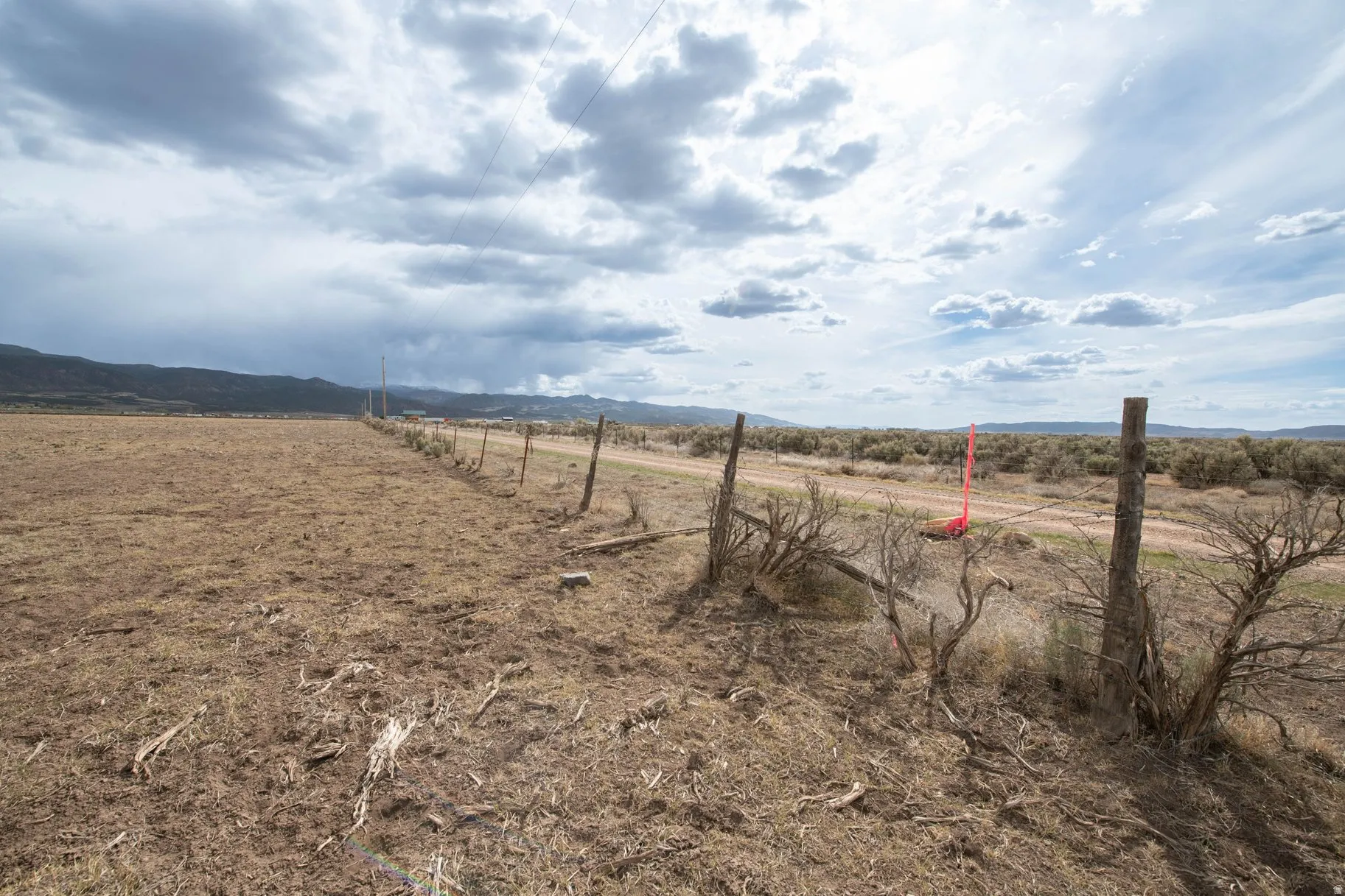 View of yard with a view of countryside and a mountain view