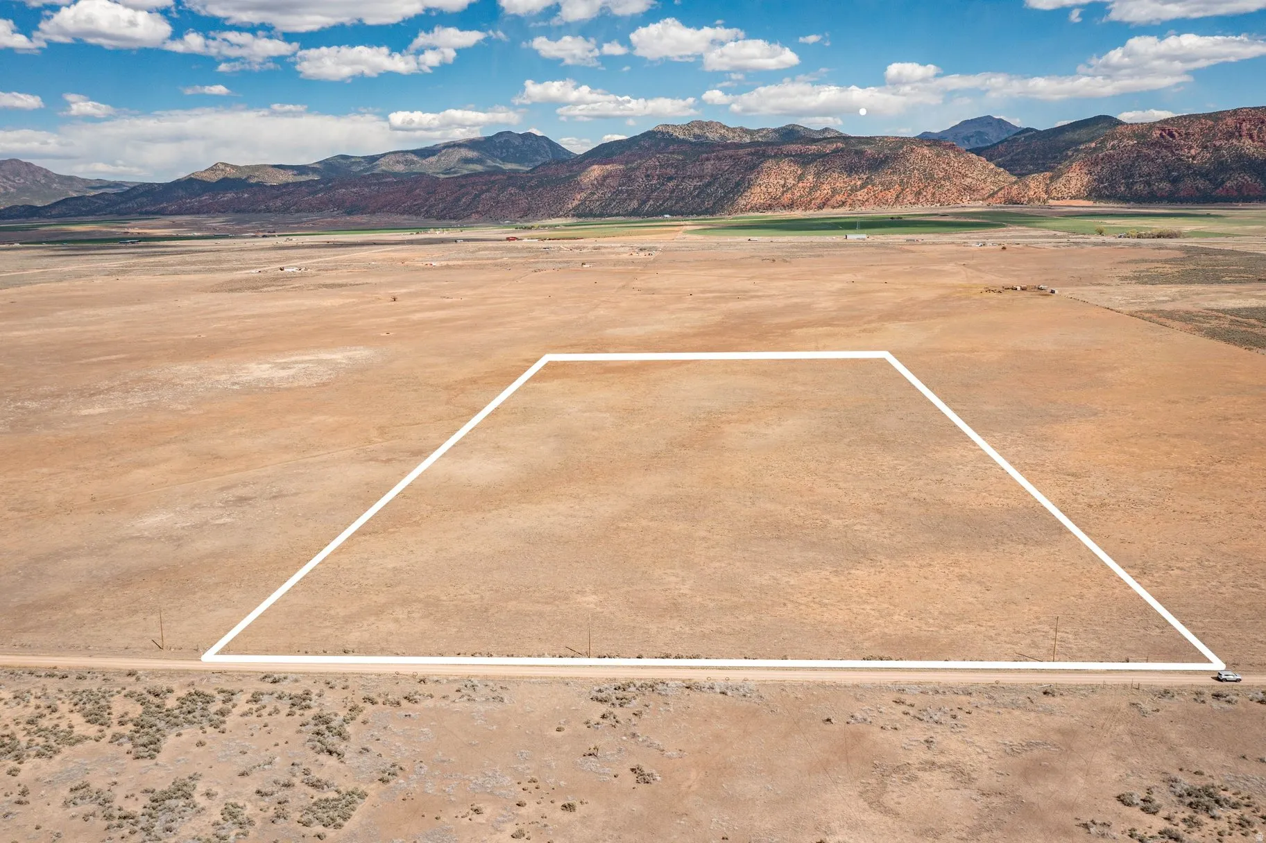 View of mountain background featuring a desert landscape and rural landscape