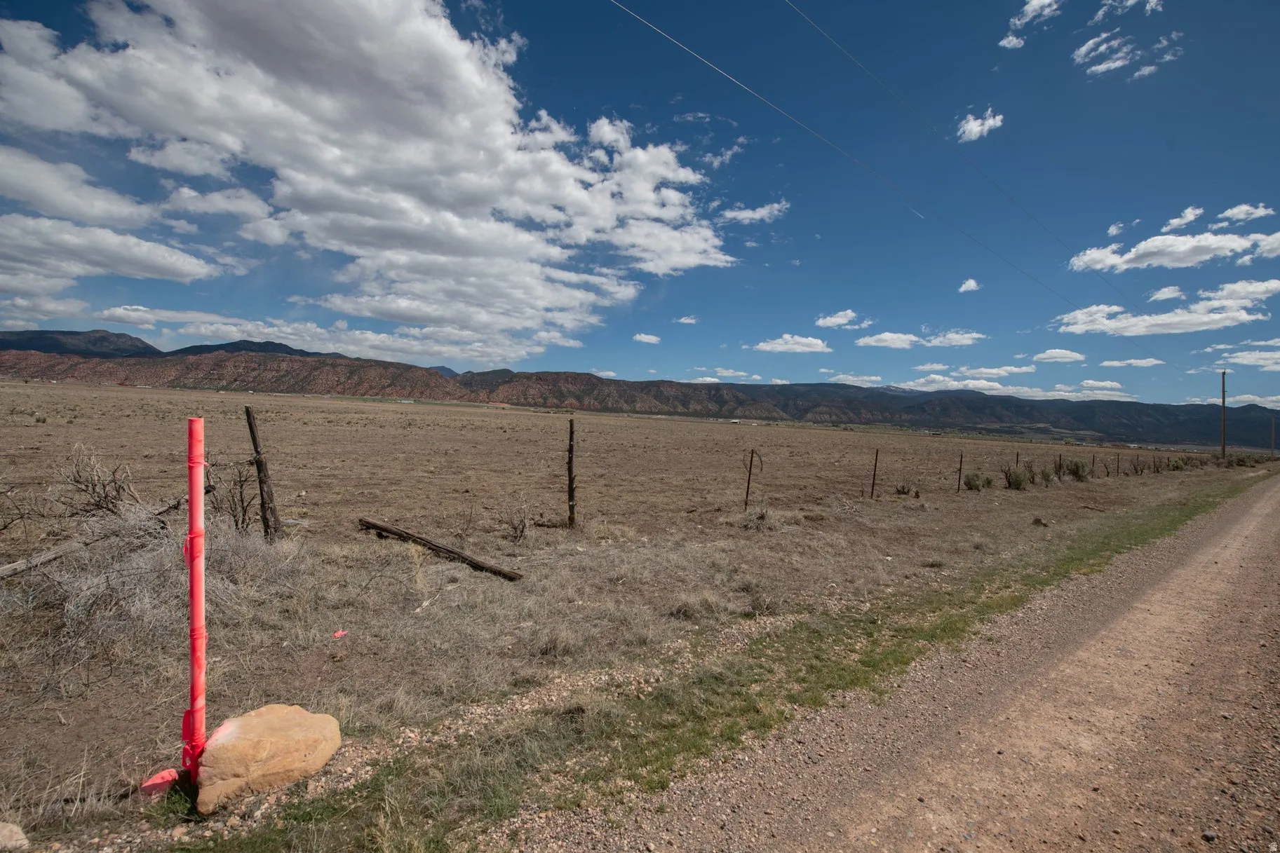 View of yard featuring a mountain view and a view of countryside