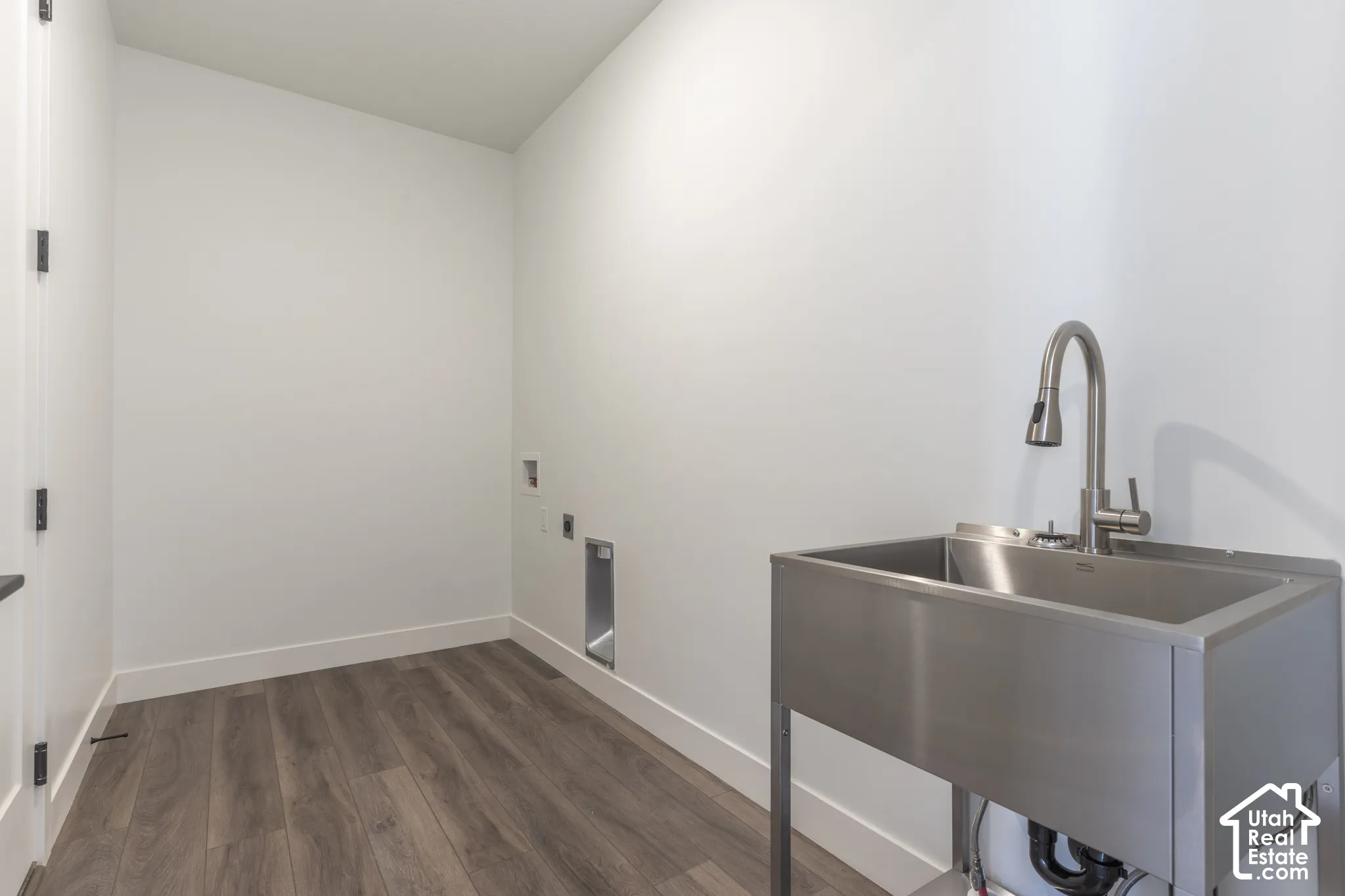 Stainless steel utility sink with a gooseneck faucet