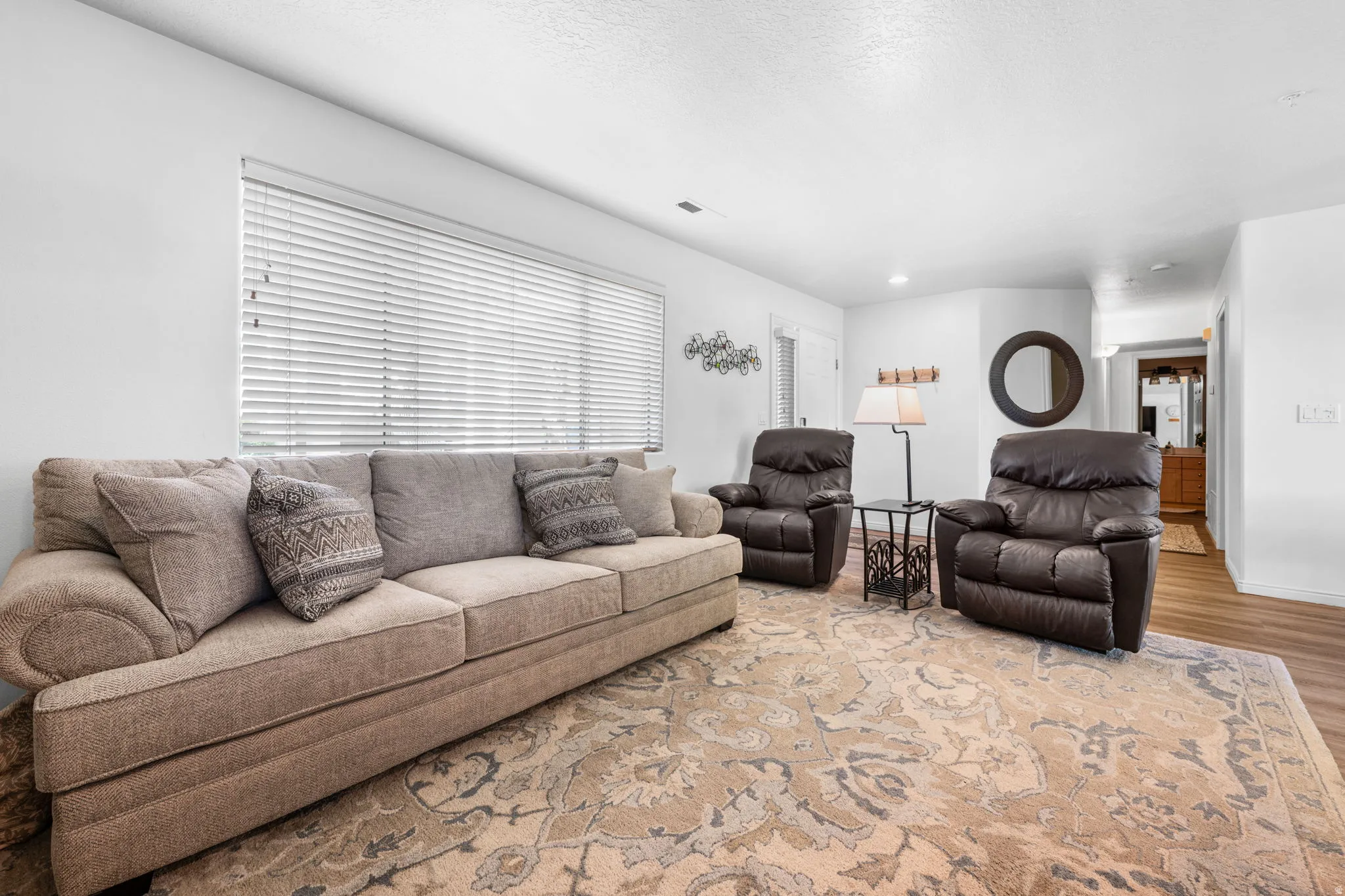 Living room featuring light wood finished floors and baseboards