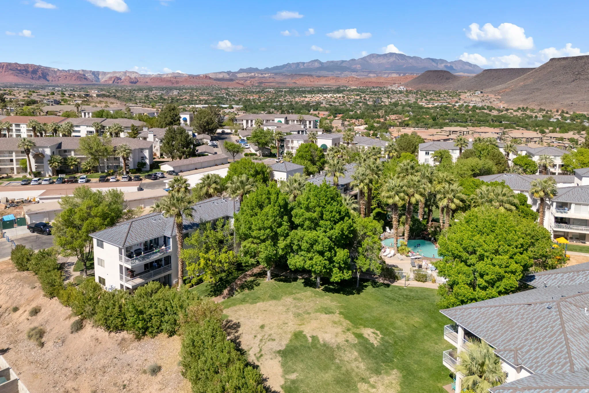 Aerial view of residential area featuring a mountain backdrop