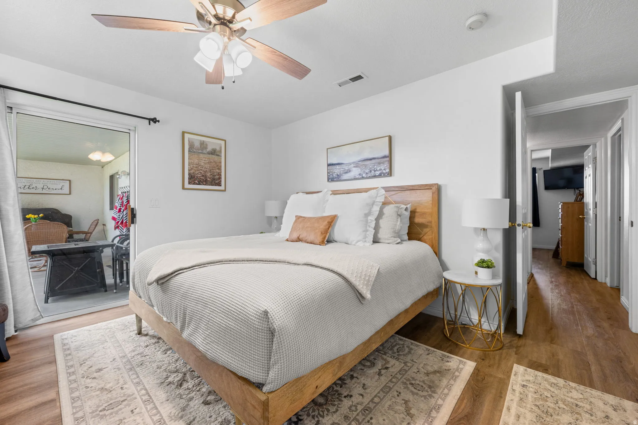 Bedroom featuring light wood-style floors and ceiling fan