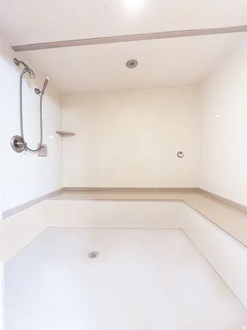 Bathroom featuring walk in shower