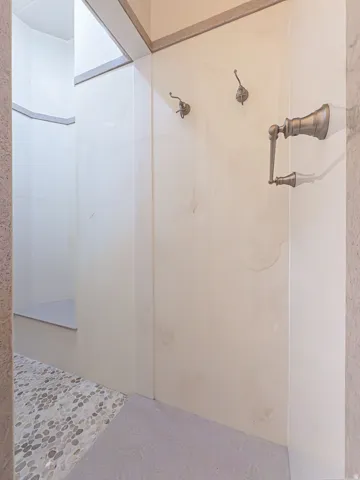 Full bath featuring a stall shower