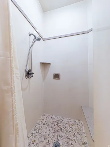 Bathroom with tiled shower