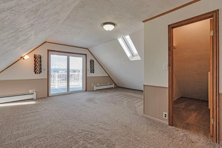 Large bonus room, and upper and lower decks designed for gathering family and friends