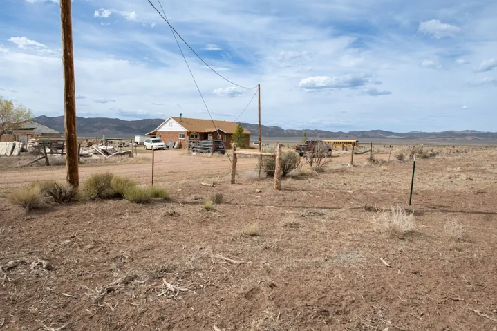 View of yard with a mountain view and a view of countryside