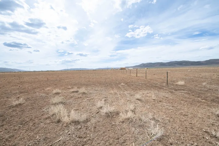 View of yard with a view of rural / pastoral area and a mountain view