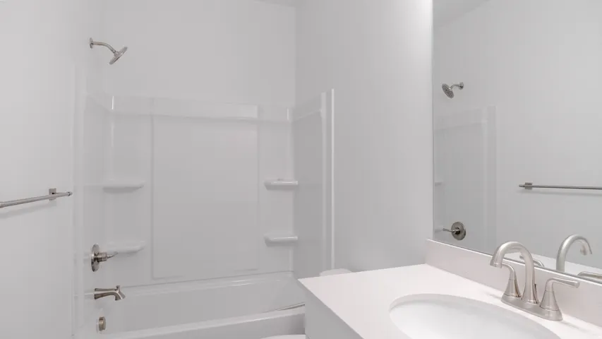 Full bathroom with vanity and bathtub / shower combination