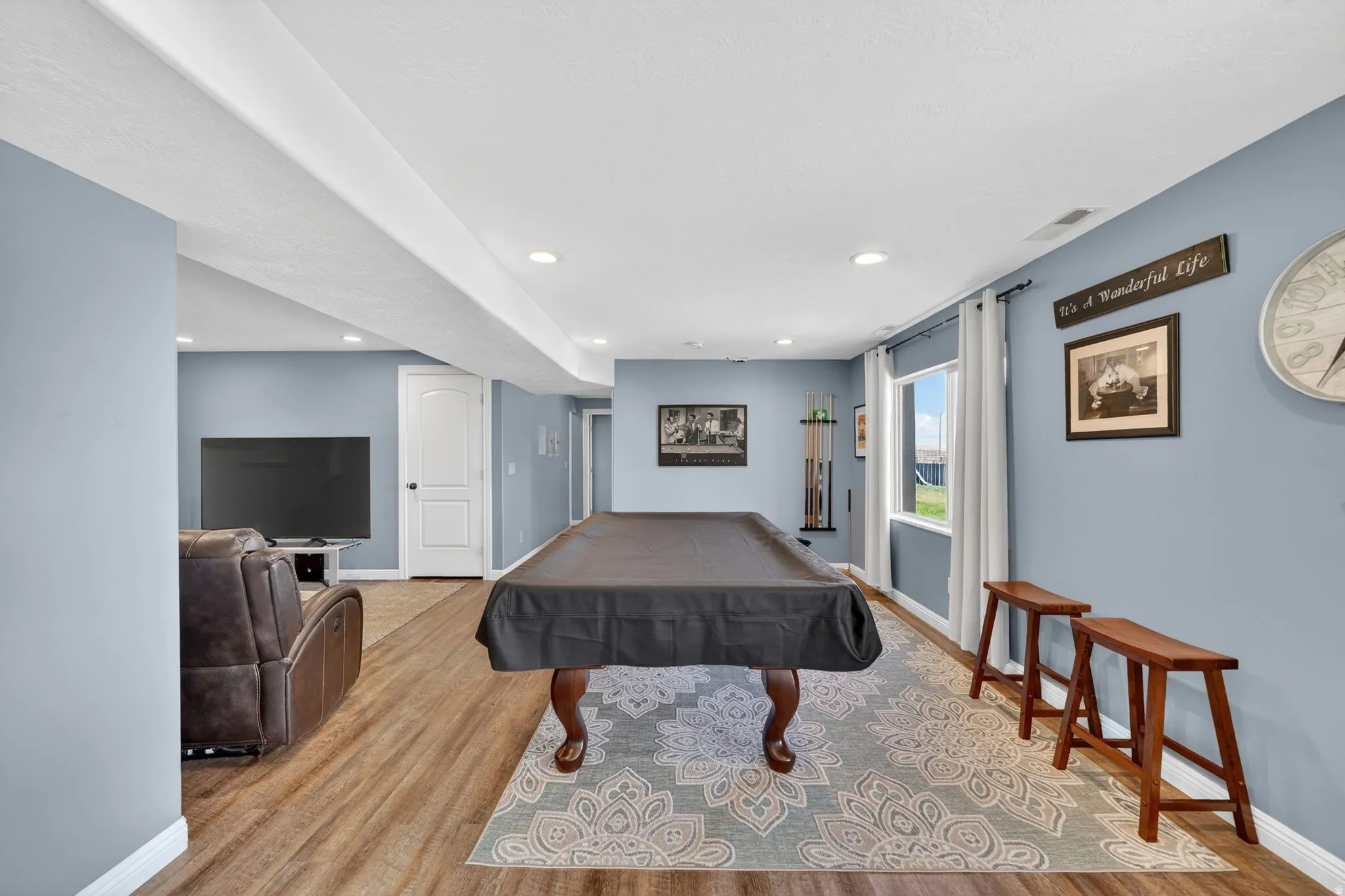 Rec room featuring light wood-type flooring, billiards, and recessed lighting