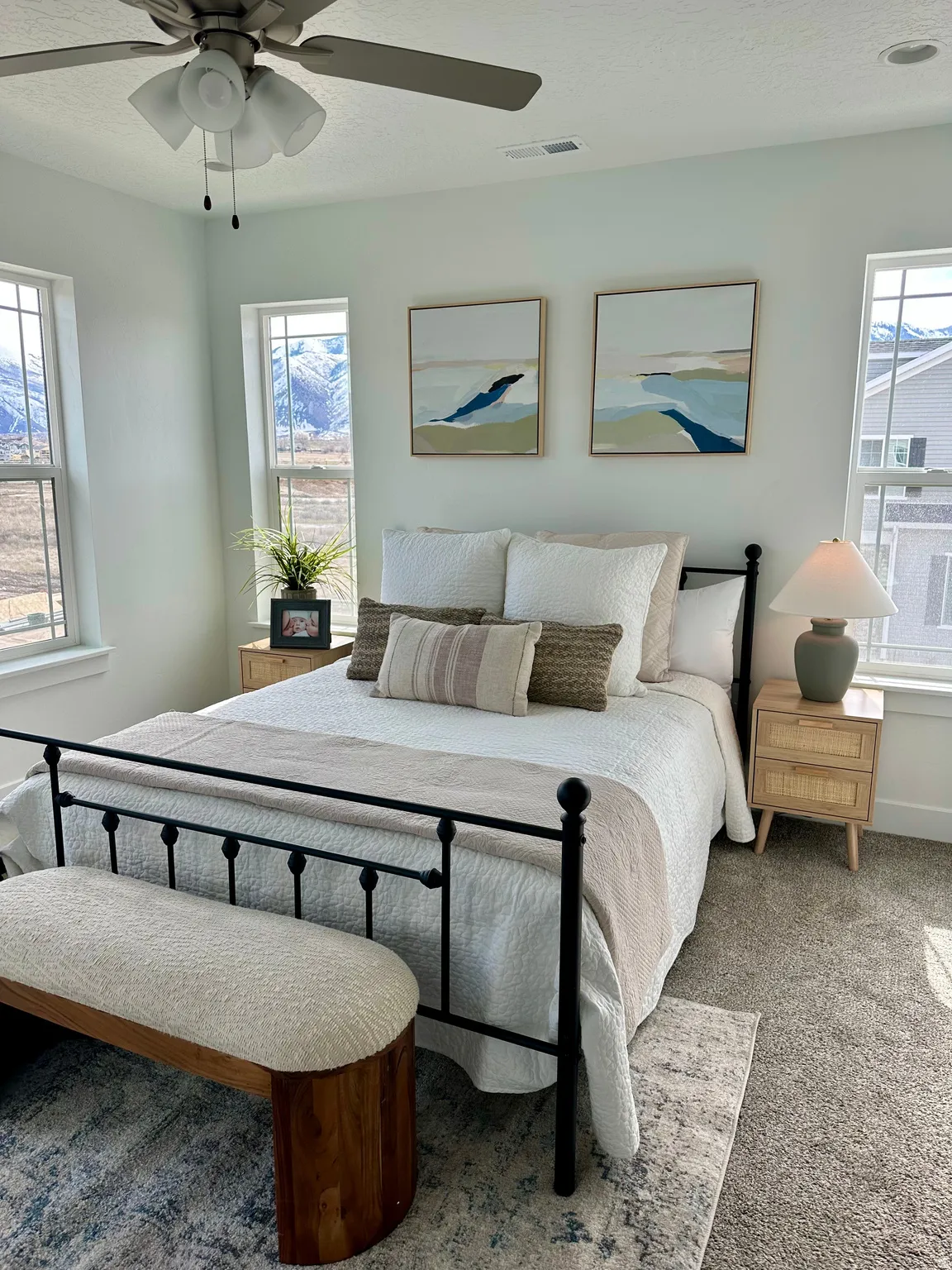 Carpeted bedroom with a ceiling fan and a textured ceilingPhotos of Dixon Model Home for reference only. Finishes may vary from photos shown.