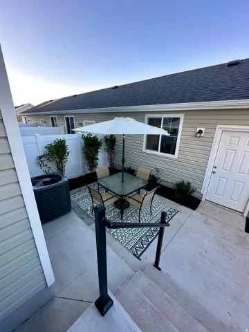 View of patio / terrace featuring outdoor dining spacePhotos of Dixon Model Home for reference only. Finishes may vary from photos shown.