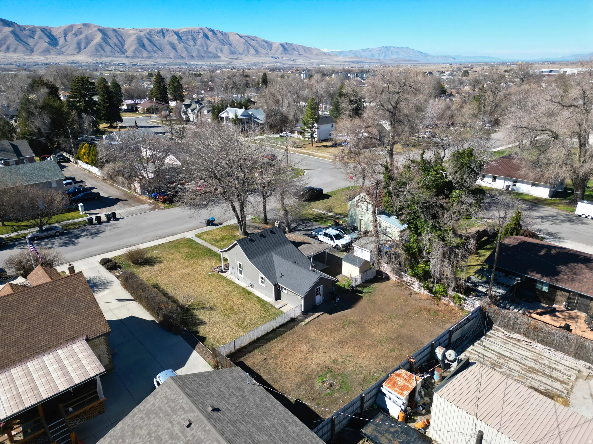 Aerial perspective of suburban area with mountains