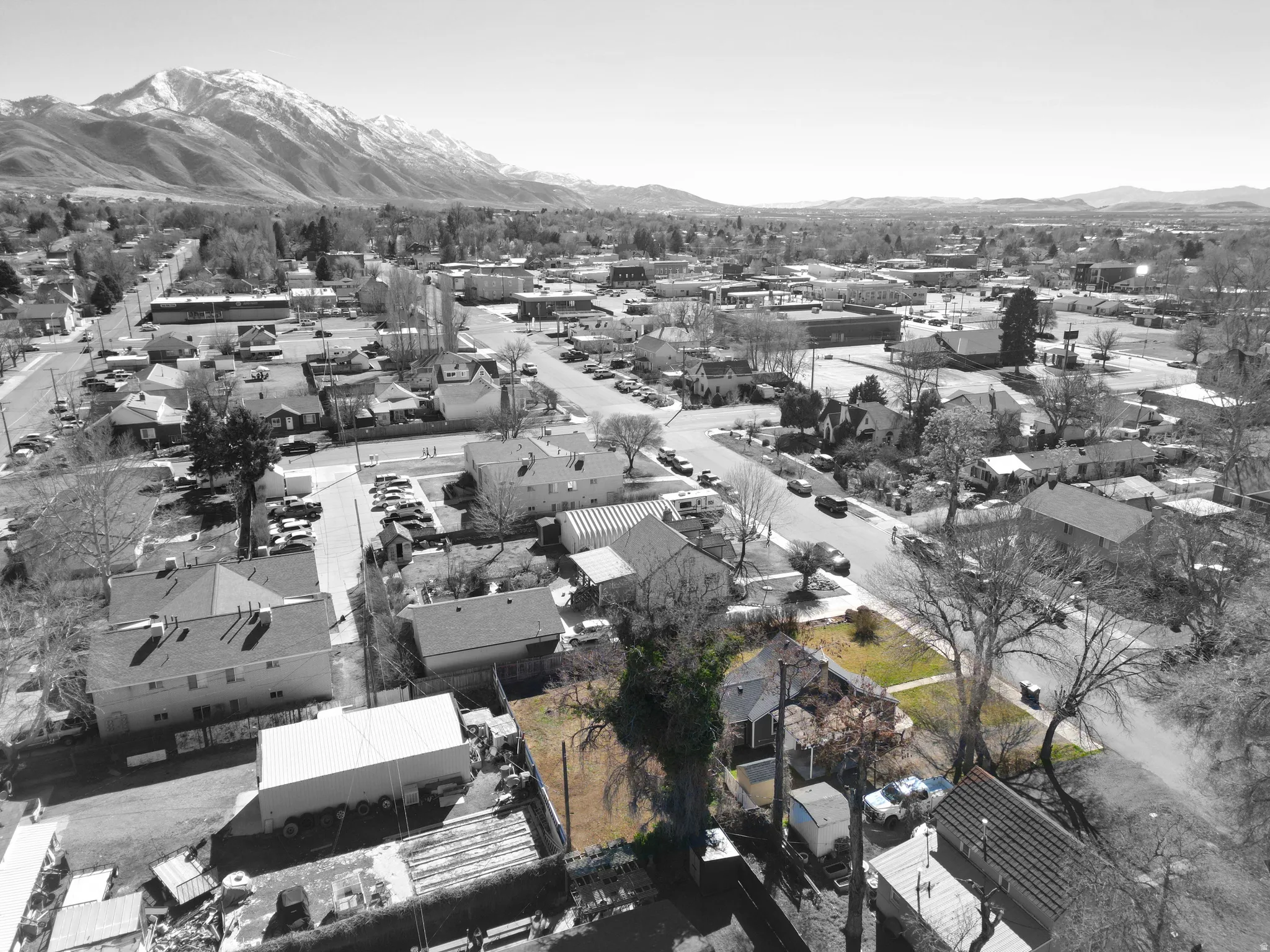 Aerial view of residential area featuring mountains