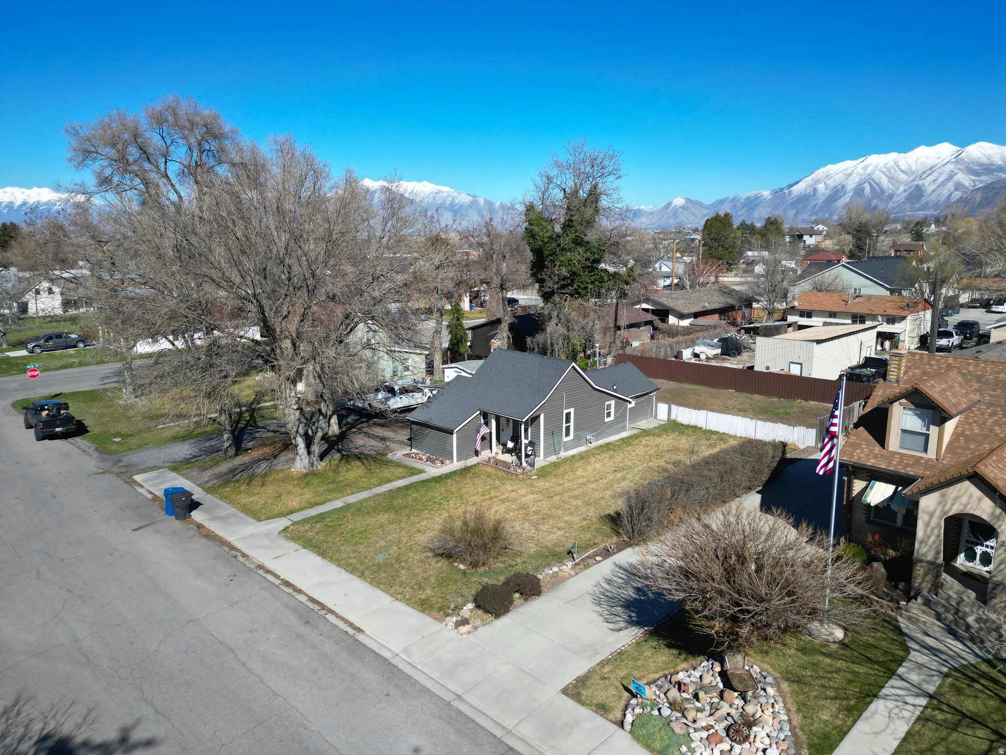 Aerial view of residential area featuring a mountain backdrop