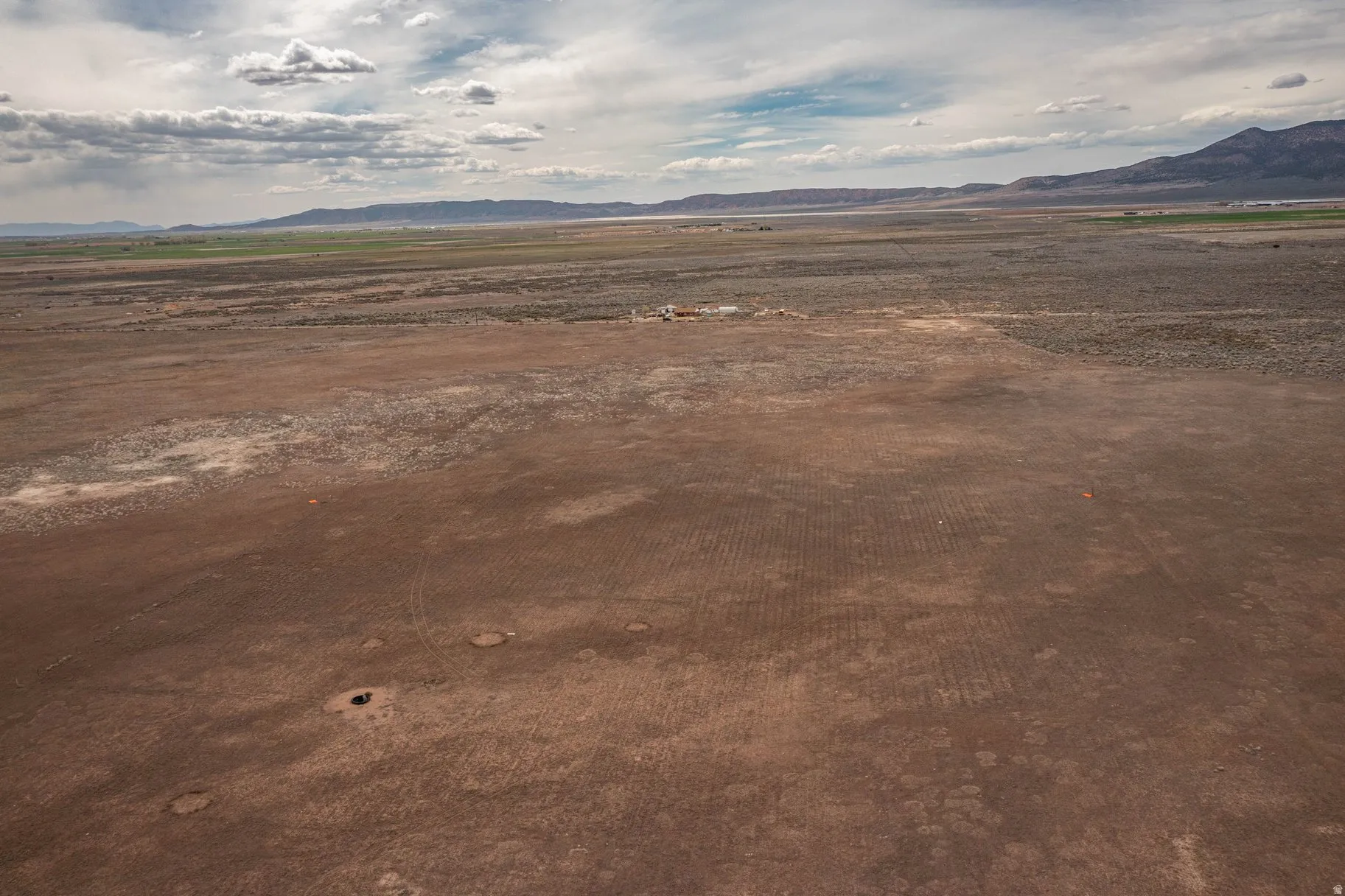 View of mountain background featuring rural landscape