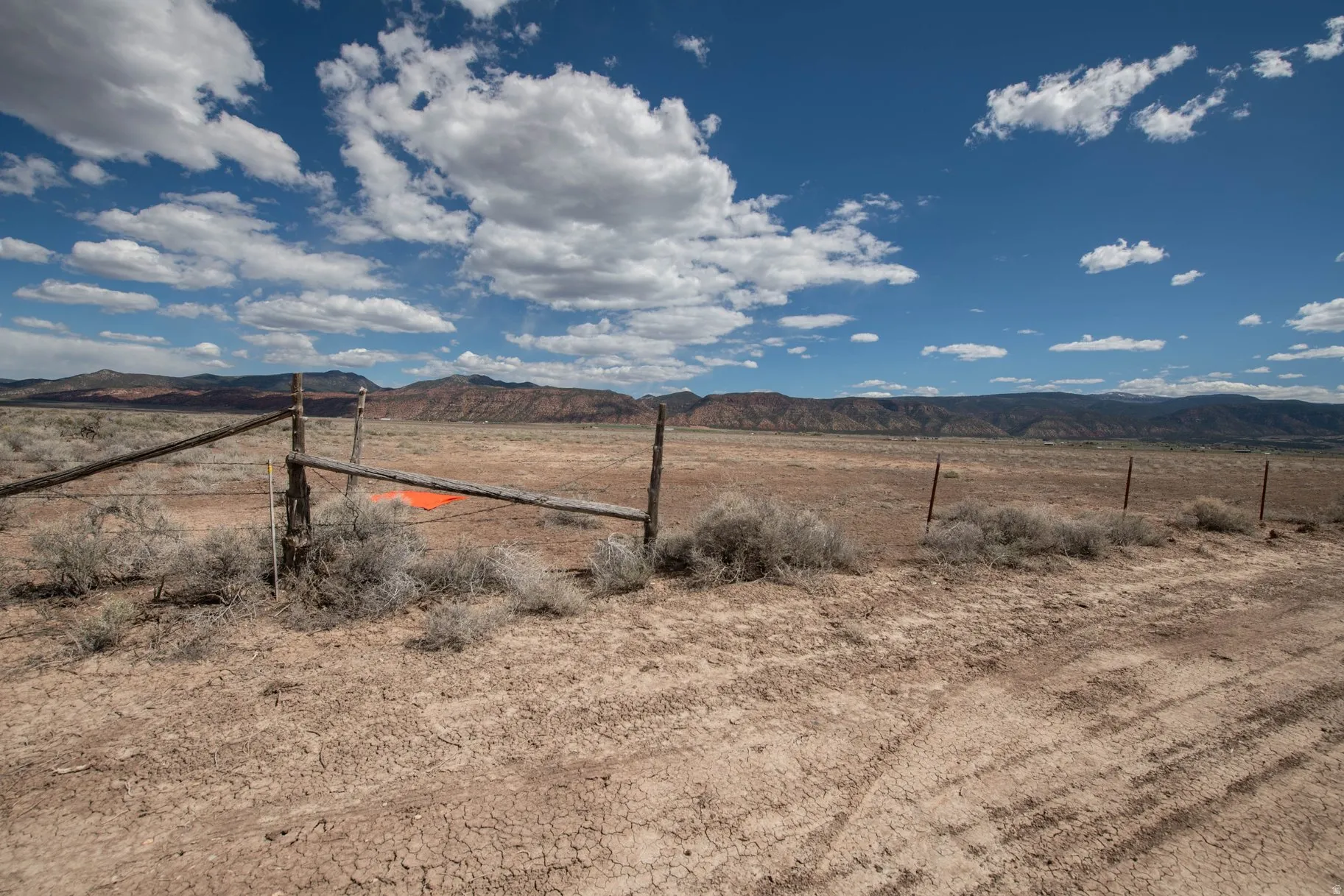 View of yard featuring a mountain view and a view of rural / pastoral area