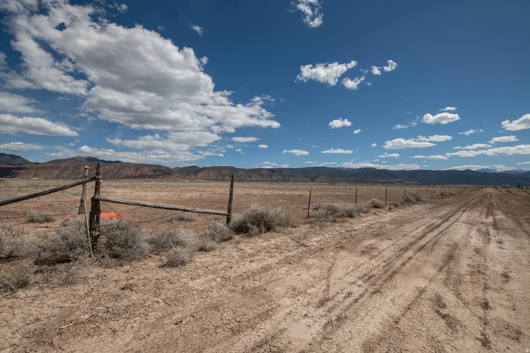 View of yard featuring a mountain view and a view of rural / pastoral area